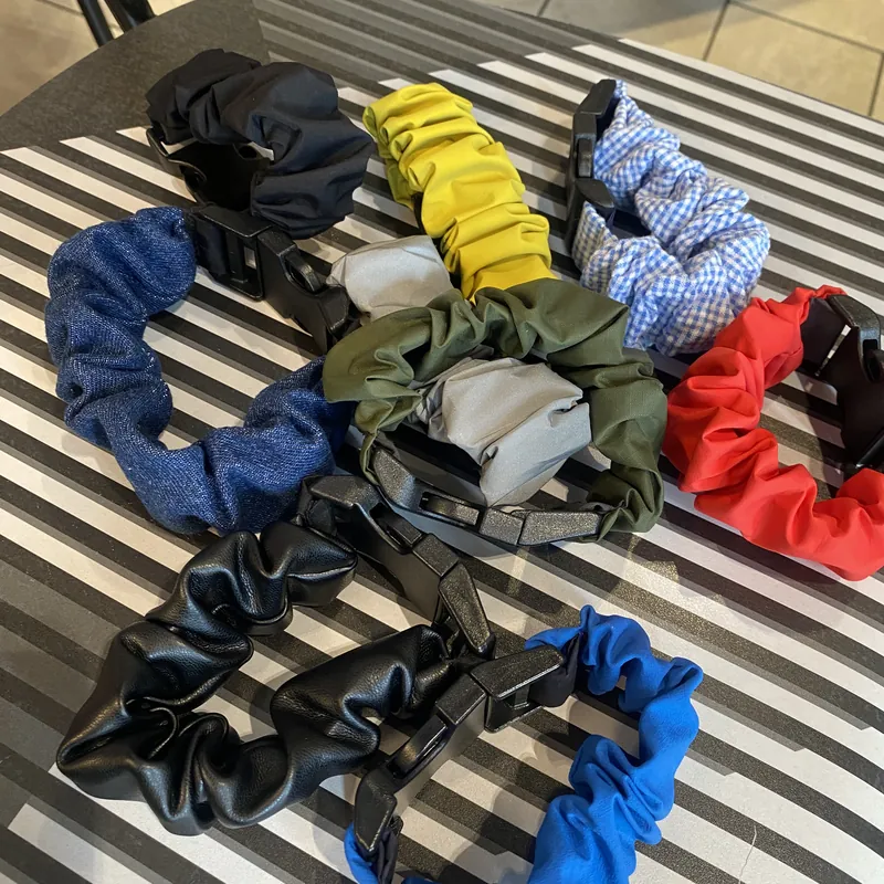 Every Pants Protector colourway laid out on a striped metal bench